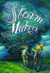 The storm makers twister racing behind girl and boy on bicycles