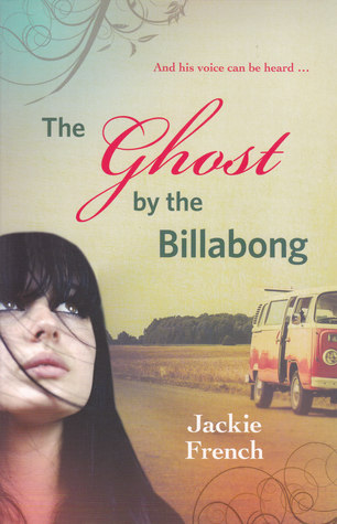 The ghost at the billabong girl with long black hair looking up blue sky and road in background red caravan on road