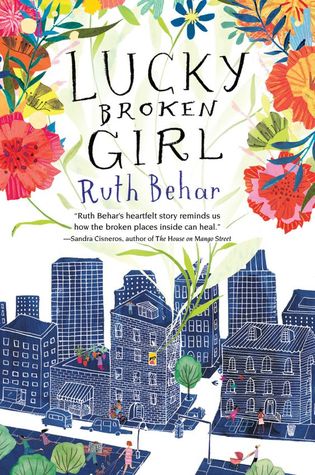 Lucky broken girl Ruth Behar colourful flowers around top of book buildings on street in blue with people walking