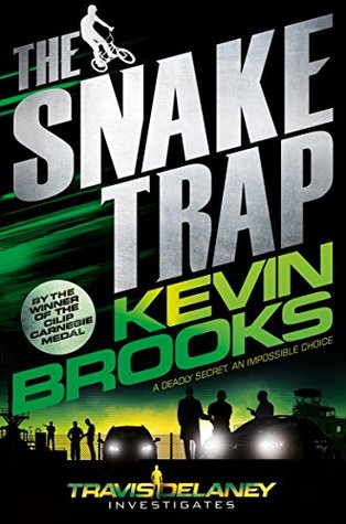 The Snake Trap in white letters. Kevin Brooks in green letters. boy on bike in white beside The. men taking beside cars at bottom. green and yellow sky behind them.