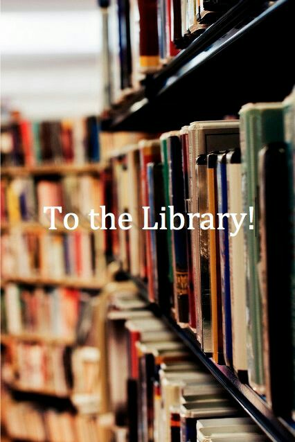 image of books on shelves from right side to left where image is out of focus. in middle in white letters To the Library!