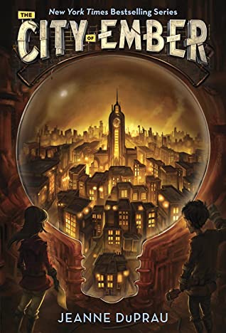 image of old looking city buildings inside glass dome with boy and girl looking from outside. dark background. white letters at top read City of Ember.