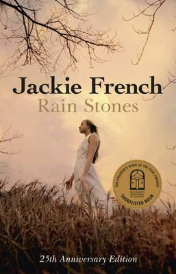 cover image of girl in white dress standing in field with branches and light colored sky above. dark and light colored letters above her read Jackie French Rain Stones.