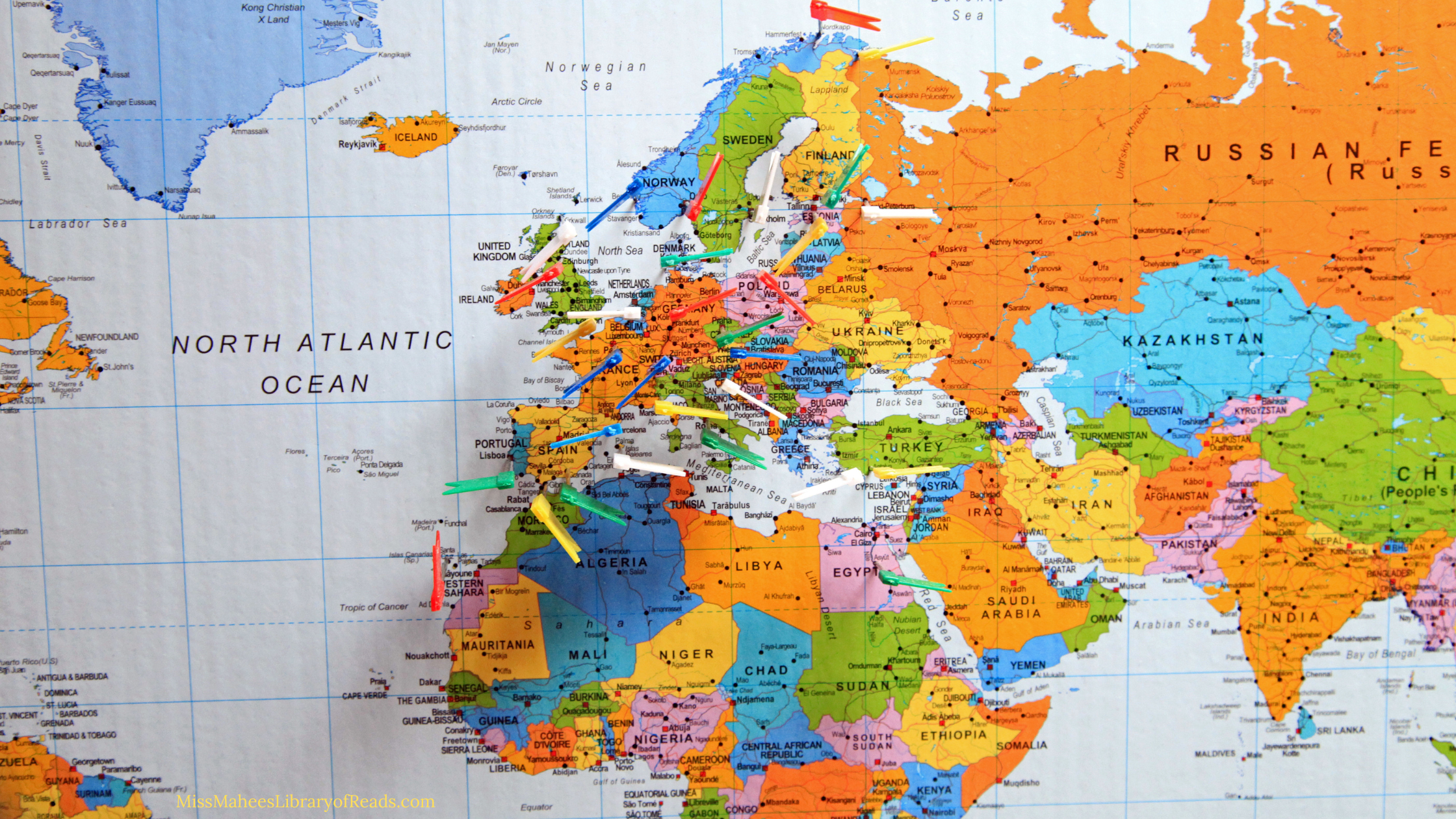 image of map of Northern countries. coloured pins or flags across European countries.