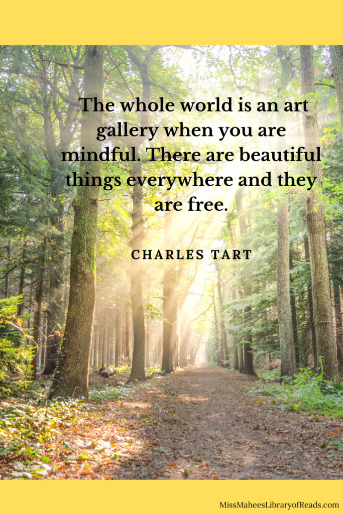 image of forest with sunlight streaming inside. yellow background. quote in black letters in top half reads 'The whole world is an art gallery when you are mindful. There are beautiful things everywhere and they are free. Charles Tart.'
