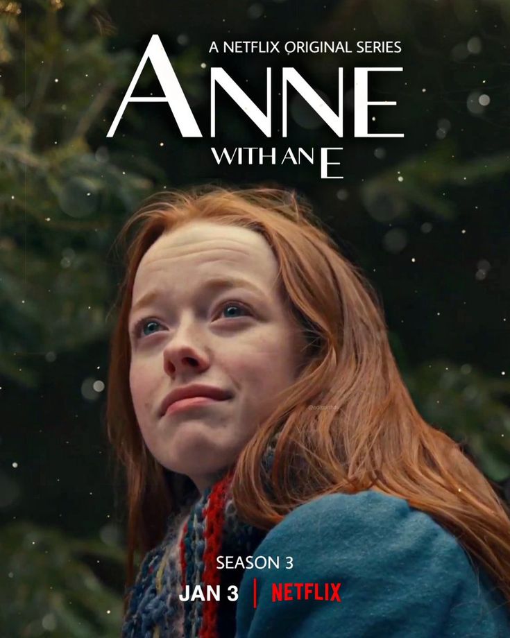photo of girl with red hair and blue coat. behind her green of trees and white letters above her reads Anne with an E.