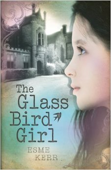 cover image of girl with dark hair in portrait on right looking at old building. image of quality of black & white photograph. dark letters The Glass Bird Girl on left of girl.