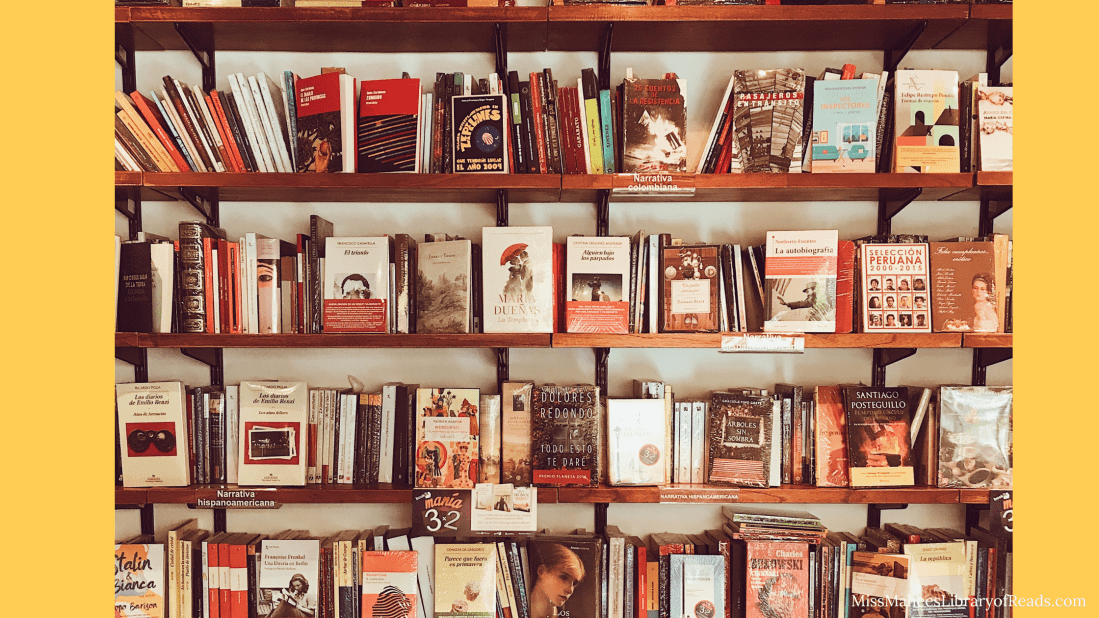 image of colourful bookshelf packed with books some facing out other spine facing. bright orange background.
