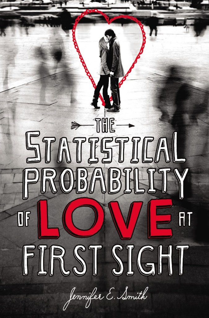 cover image has young couple in middle of street or plaza. image in black and white. boy and girl couple have red heart shape around them. white and red letters below them reads 'The statistical probability of love at first sight. word The has arrow through it.