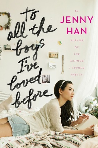 image of young Asian-American teen girl in white jumper and jean shorts writing in book on bed. small things stuck to white wall behind her. black cursive letters above her reads 'To all the boys I've loved before.'