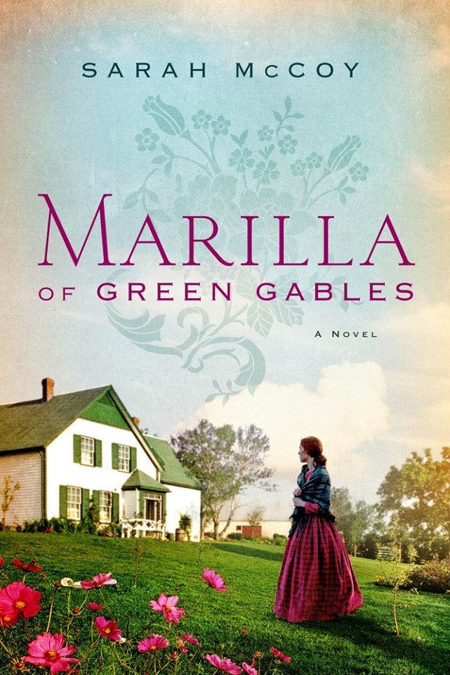 cover image of woamn in pink dress looking at white and green house from garden. light blue and clouds above. large pink letters in sky reads Marilla of Green Gables.