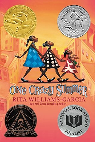 cover image of three African American girls in blue, black and red and white dresses walking in middle of road. orange and pink-hued buildings and street around girls. four seals in four corners of image. large white letters in middle reads One crazy summer.