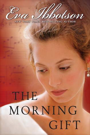 image of young woman in white dress with brown hair looking down. sheet music background in orange-red shadows. black letters at bottom edge reads The Morning Gift and cursive white letters along top reads Eva Ibbotson.