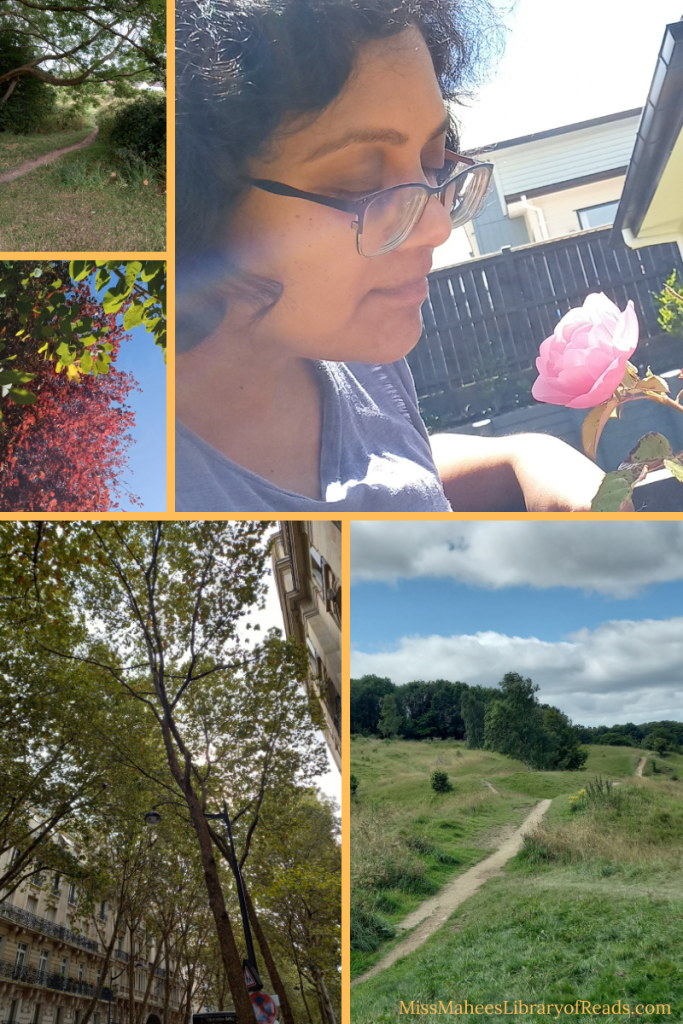 Five-grid collage. top right image of author looking at pink flower. dark fence and edge of house in background. bottom right image of small country pathway over hills. dark green trees towards middle and white clouds and blue sky above. bottom left image of tree canopy with buildings on either side of them. left middle image of red leaves and green leaves with a small corner of blue sky on bottom right of image. top left small image of country path leading between bushes and below tree branches. green leaves around branches with little of blue sky showing in between.