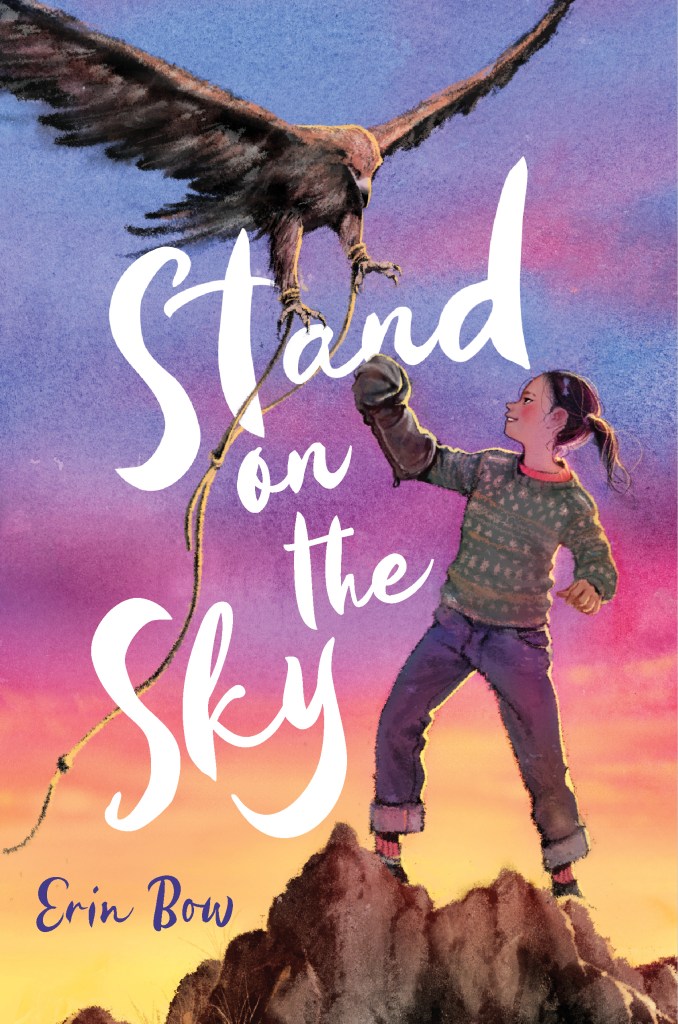 cover image has young girl in green sweater and jeans standing on mountain top with cloth on right arm, a large eagle poised to land on her arm. sky behind has purple from top, pink in middle and orange-yellow at bottom. large white letters in middle between animal and human reads Stand on the Sky.