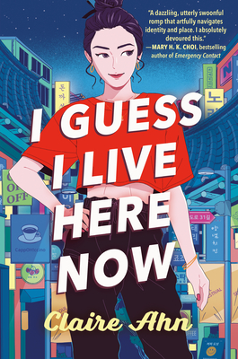 cover image of Asian-looking girl with fair skin in red top and black pants smiling with one hand on hip. background is streets-cape with buildings and signposts of cafes. blue sky at top. large white letters across girl reads I Guess I Live Here Now with yellow letters below Claire Ahn.