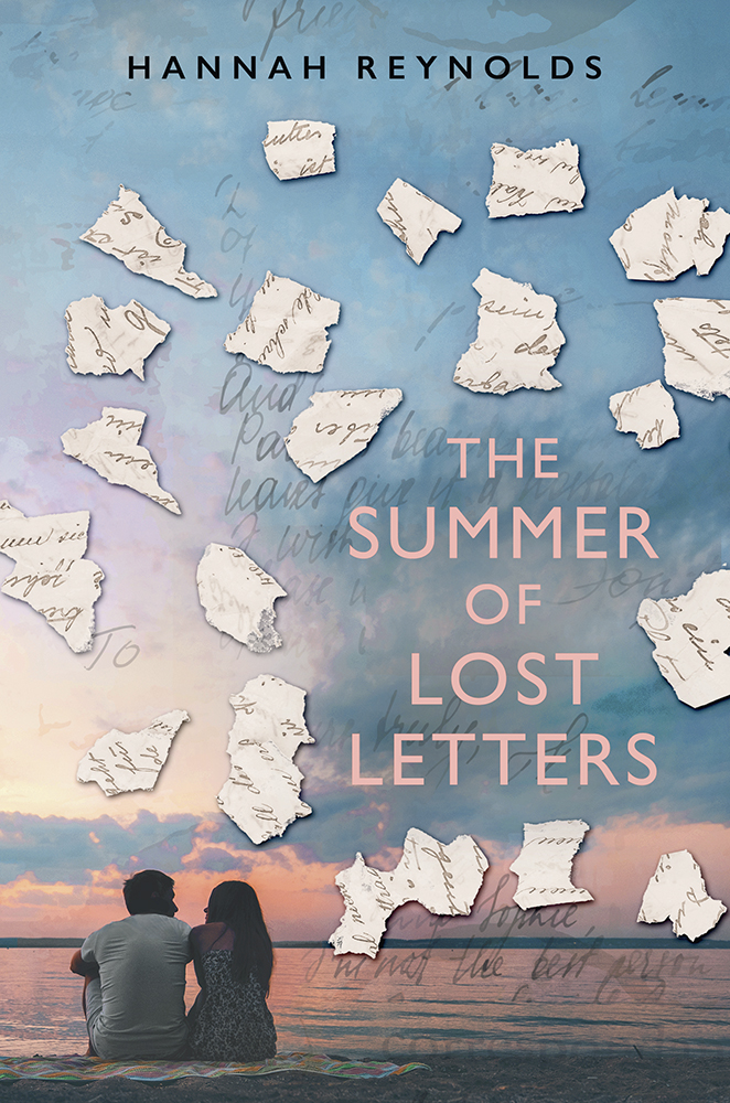 cover image has young teen couple, boy in white shirt and girl in flowery dress, seated on blanket on beach beside still water at bottom of image. sky orange at bottom and light blue at top with some clouds darkening towards top. broken pieces of paper around pink/orange letters that read The Summer of Lost Letters in middle right of image. small black letters at top reads Hannah Reynolds.