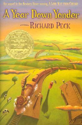 cover image has brown-coloured steam train running across green landscape of hills and valleys with houses and cows. small shape of woman in red dress with umbrella beside top section of train. low-lying brown clouds and yellow-orange-purple sky at top of image. large yellow letters at top reads 'A Year Down Yonder' with darker letters below reading Richard Peck. image of golden seal of Newbery Award on top left of image.