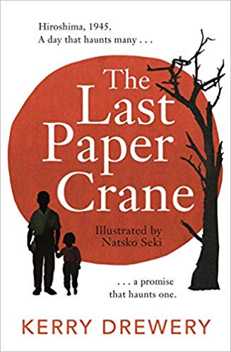 cover image has man holding hand of young girl in shadows on left of image with dark leafless tree on right. bright red sun/circle in middle with white background. large white letters across red globe reads 'The Last Paper Crane' and smaller black letters under it reads 'Illustrated by Natsko Seki.' small black letters above image reads 'Hiroshima, 1945. A day that haunts many...' and below '...a promise that haunts one.' red letters across bottom edge reads Kerry Drewery.